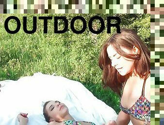 Delicious muff divers go down on each other outdoors