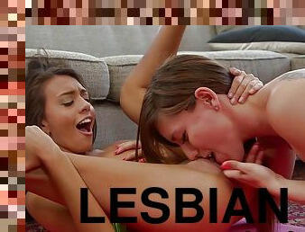 Pierced dyke gets her pussy fingered by tattooed lesbian