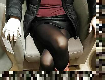 Fully dressed crossed legs orgasm in a store