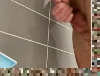 Male in the shower cum massive on the tiles !! Big cum