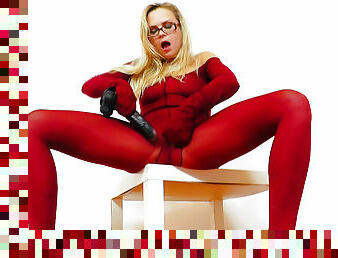 Blonde wearing glasses and red outfit masturbates with toy