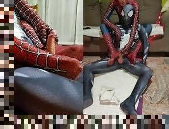 Spiderman and Venom give each other a footjob from behind