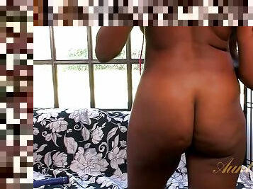 Raunchy ebony with saggy tits toys her shaved fuck hole