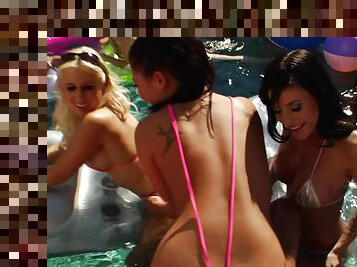 Hardcore brunettes are posing naked at the pool