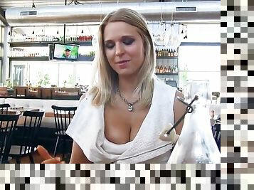 Gorgeous blonde teen pops her tits in a diner