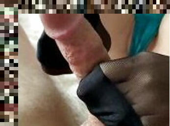 Sensual black stockings footjob