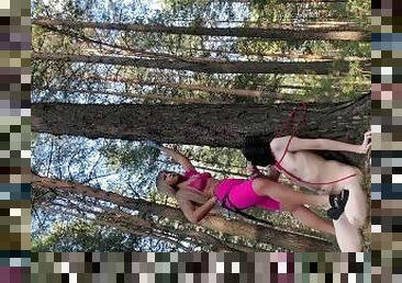 Domina Evgenia - a slave tied to a tree sucking my strapon and eating my ashes