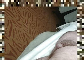 Lazy first morning piss from bed in hotel room