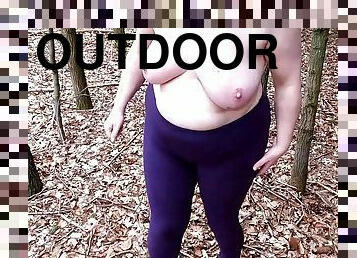 Topless in the woods - hitting her tits hard