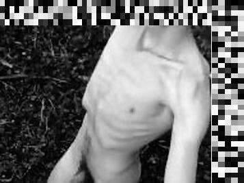 Slender man running around the forest completely naked black and white video